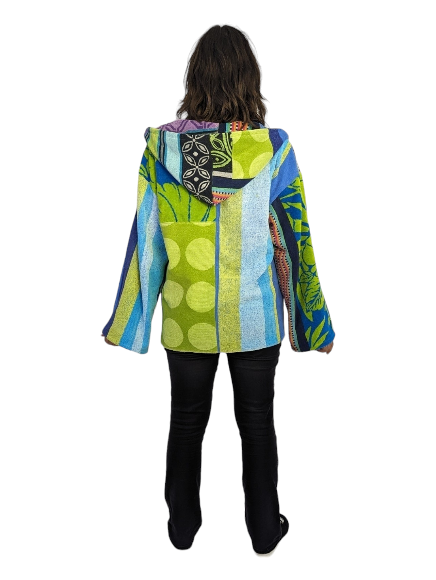 Rear view of woman wearing patchwork hoodie with hood down.