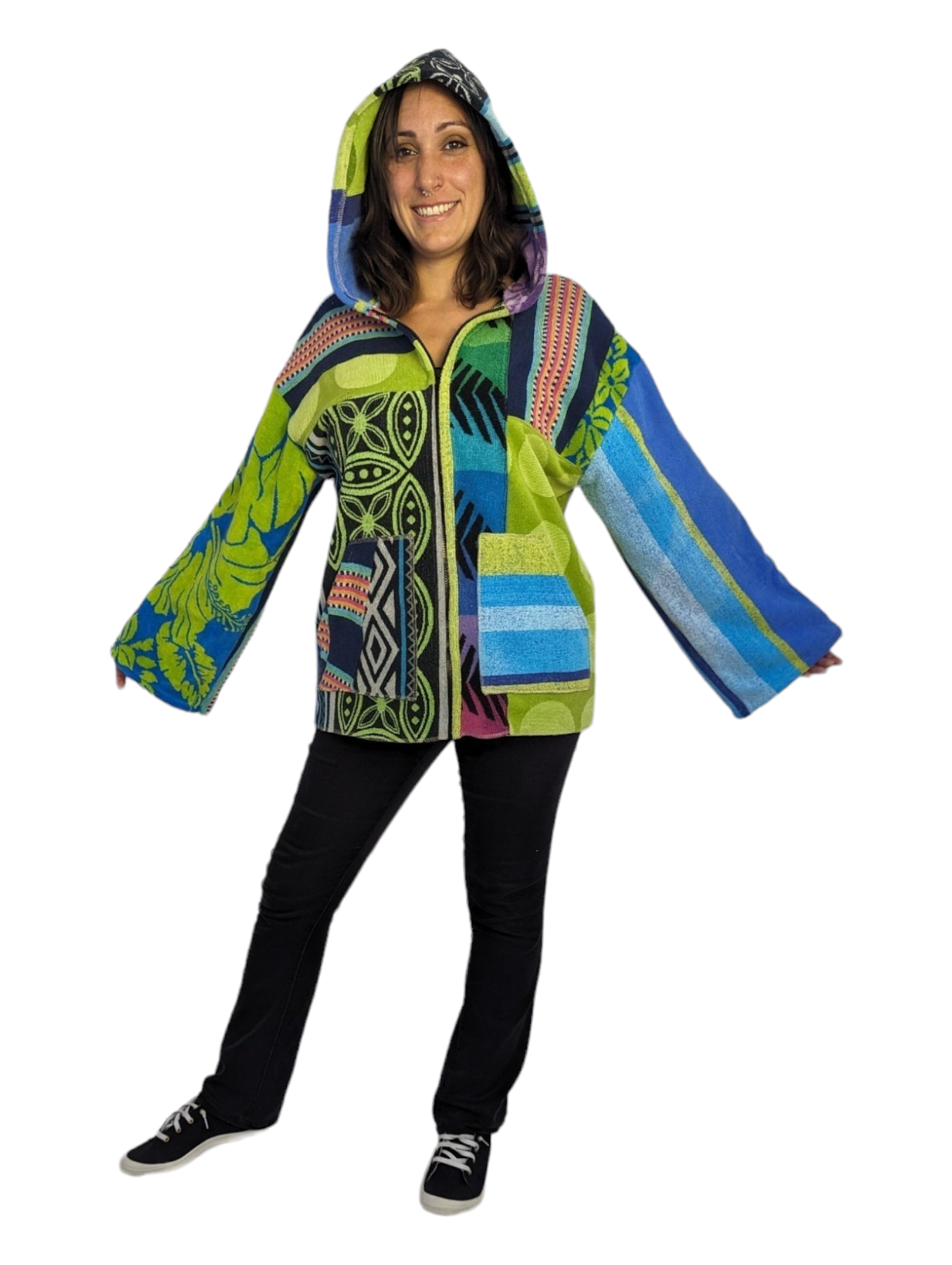 Woman wearing patchwork hoodie made from upcycled towel scraps.