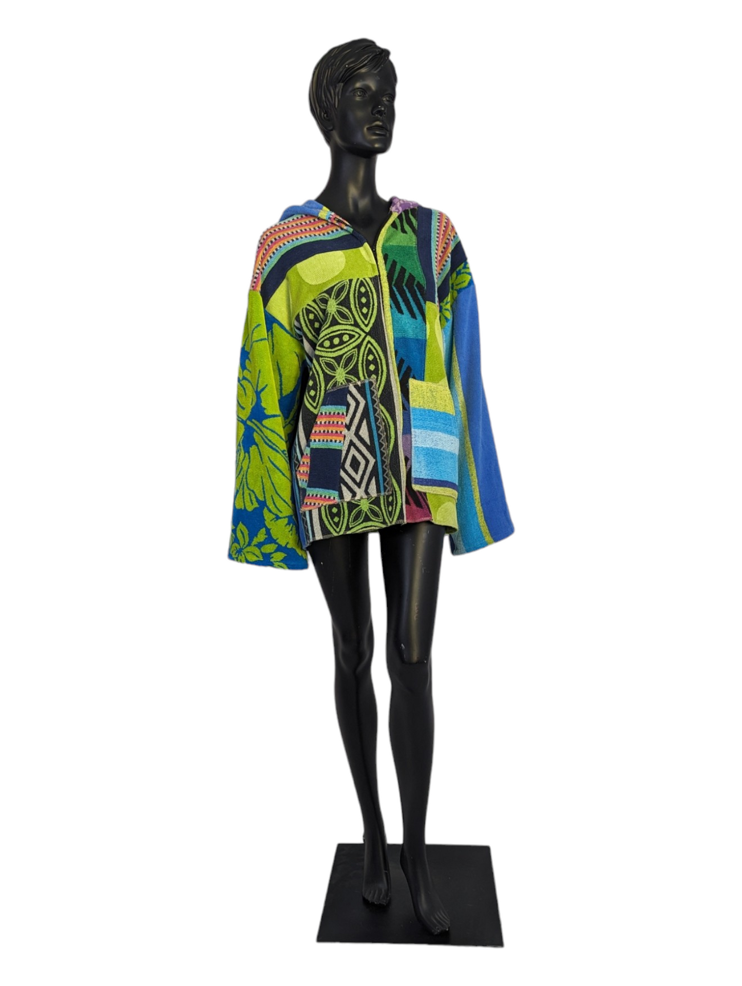 Front view of mannequin wearing patchwork zip front hoodie.