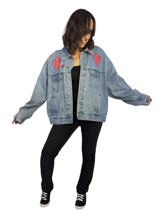 Front view of woman wearing Phish denim jacket