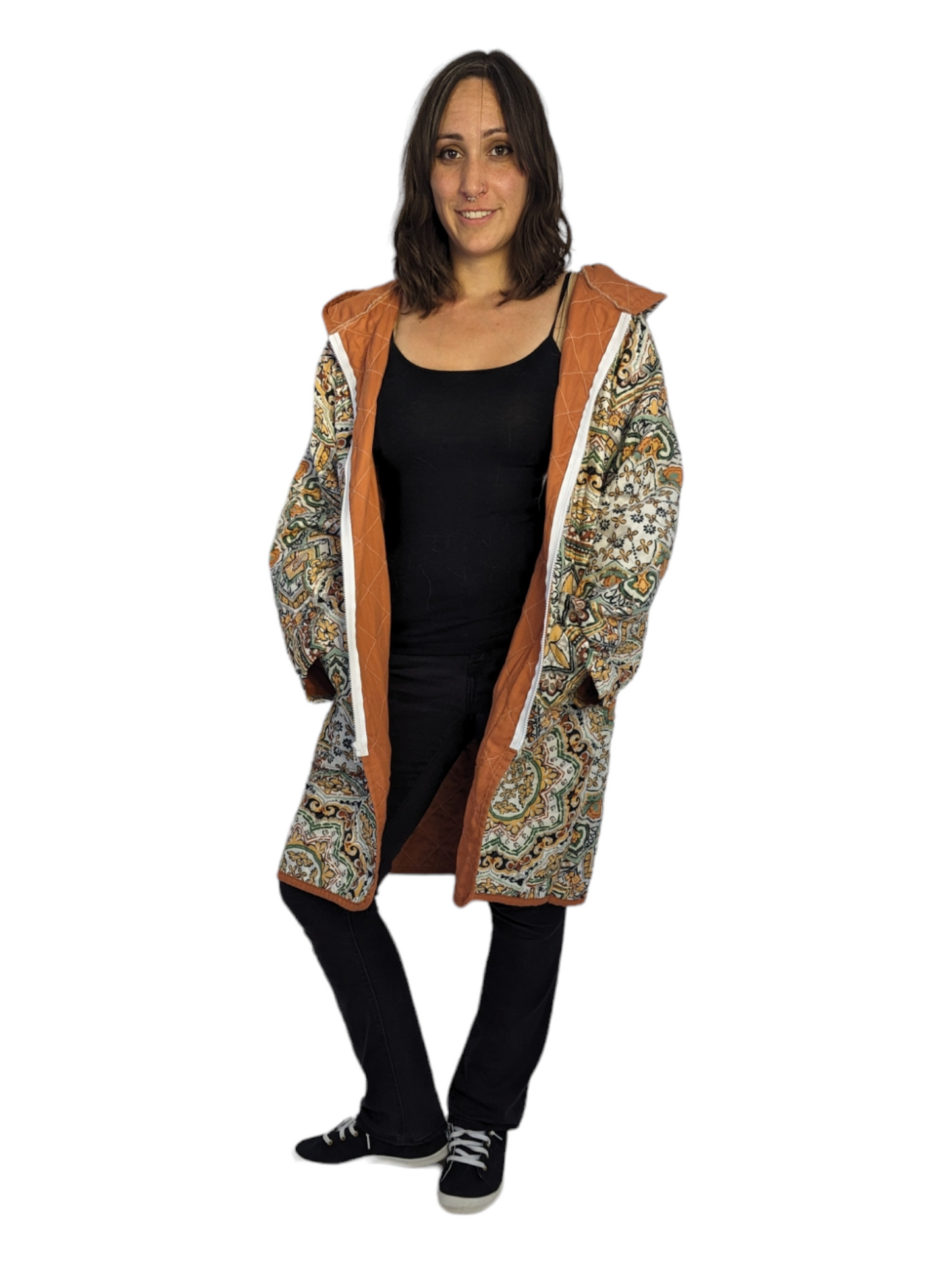 Front view of woman wearing upcycled quilt hoodie.