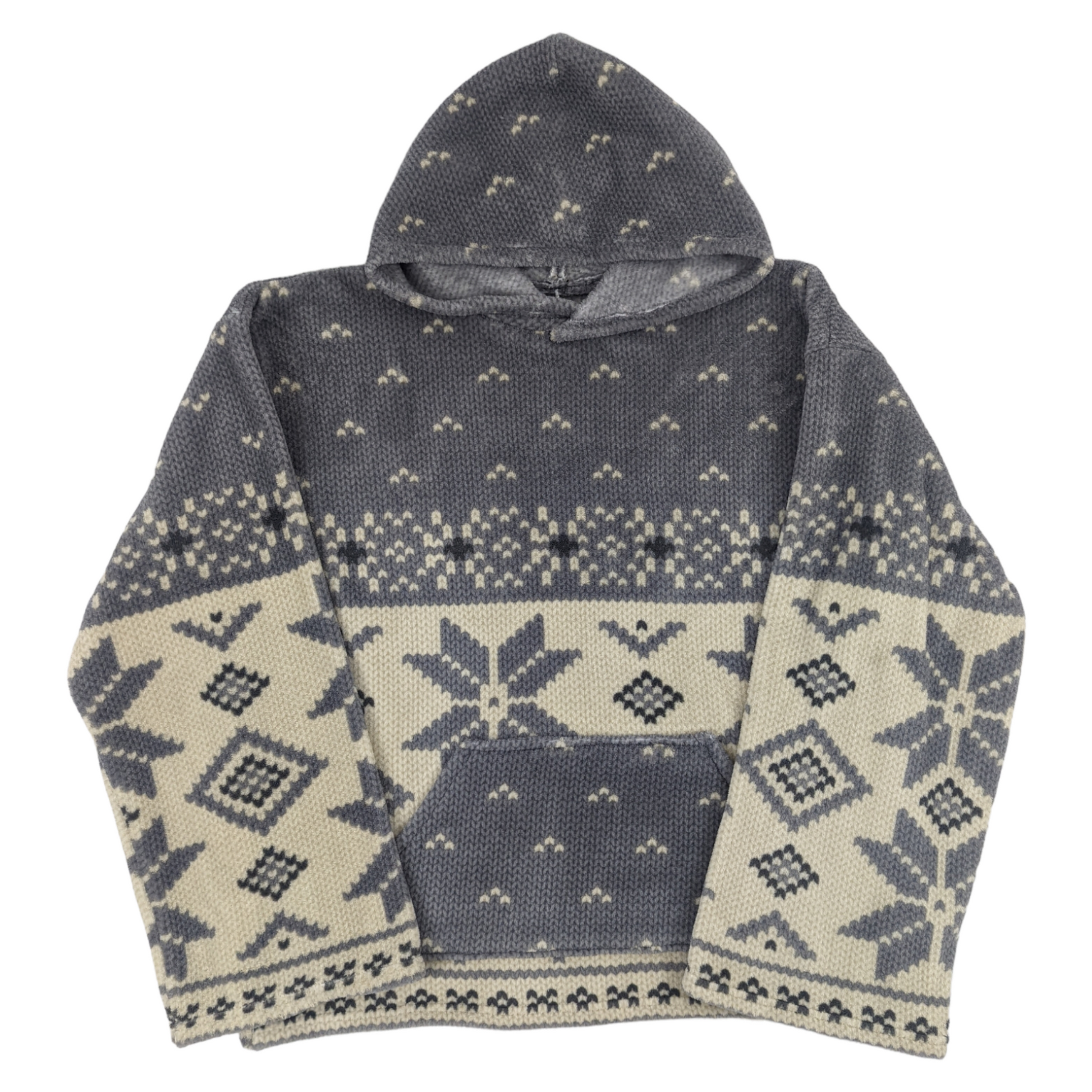 Flat lay of fleece hoodie with snowflake pattern in crochet print.