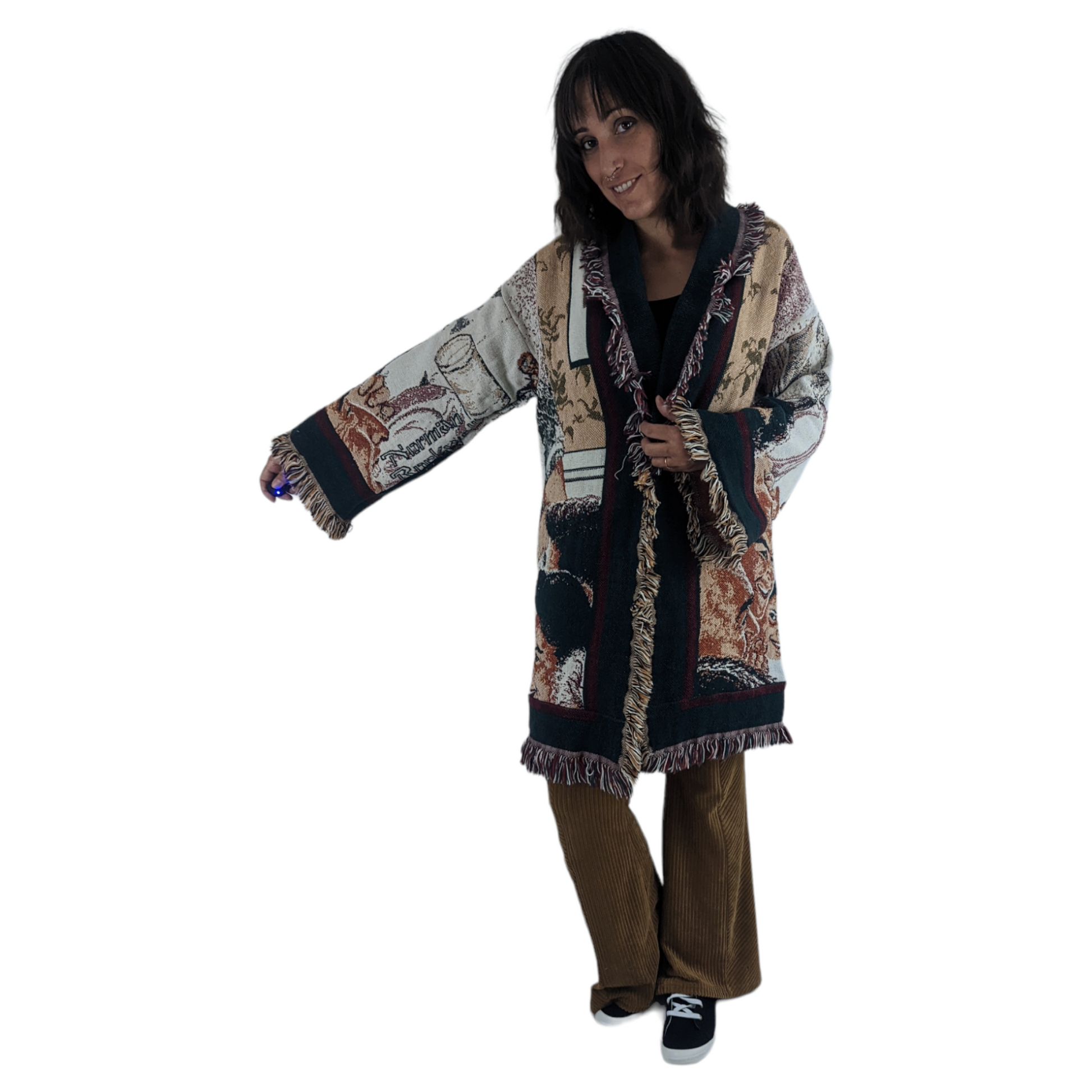 Front view of woman wearing tapestry blanket coat with Norman Rockwell's Freedom from Want.